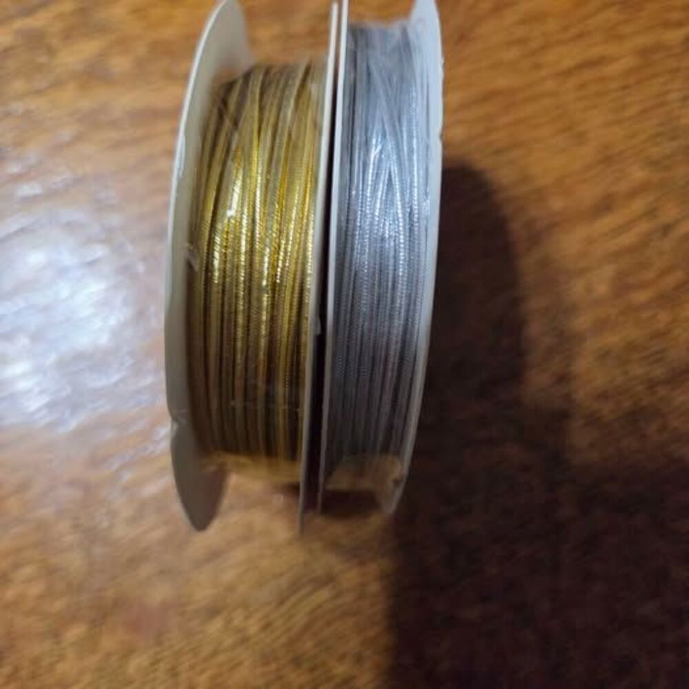 2 new rolls gold and silver elastic trim 1/16 inch
